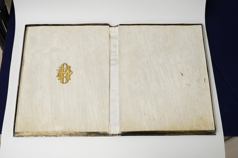 A white metal mounted rectangular desk folder, with beaded borders and pierced and decorated with scrolling foliage, birds and oval panels depicting figures at various pursuits, stamped '13', 30.6cm. Condition - poor to